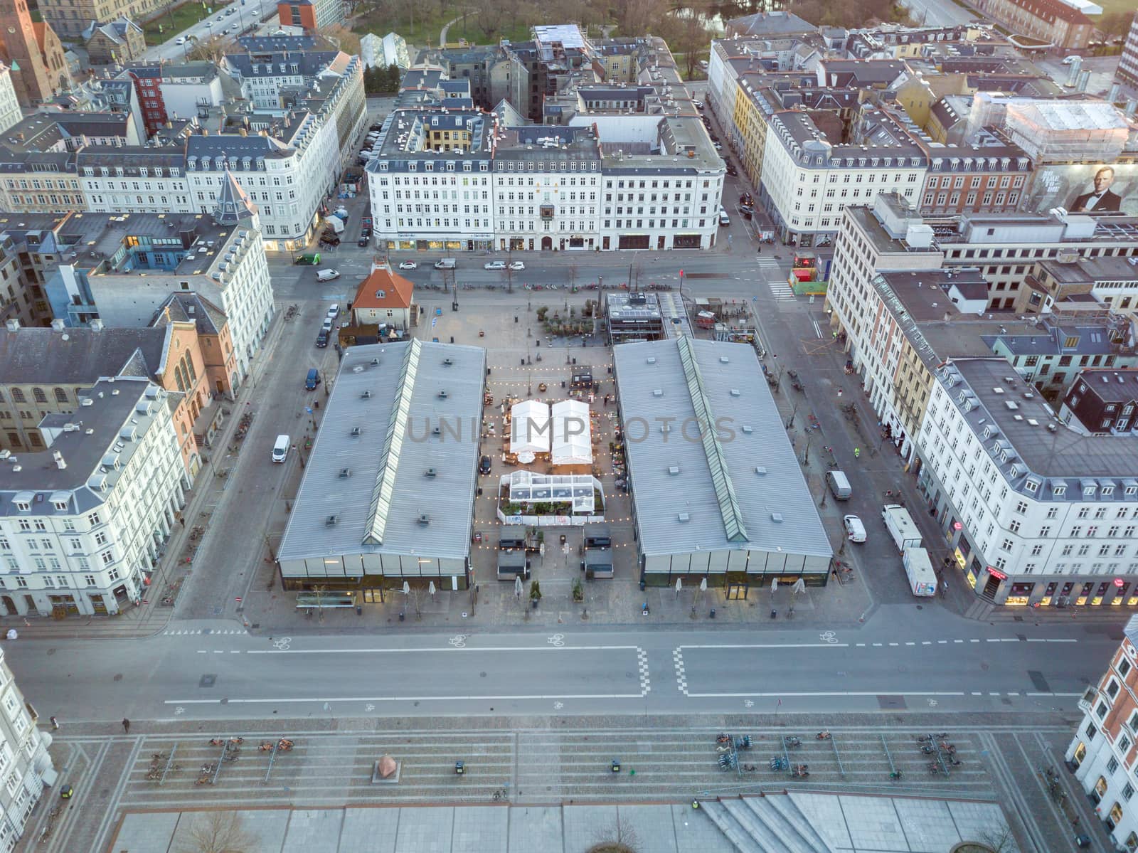 Copenhagen, Denmark - March 31, 2020: Aerial drone view of Torvehallerne, a popular modern market place.