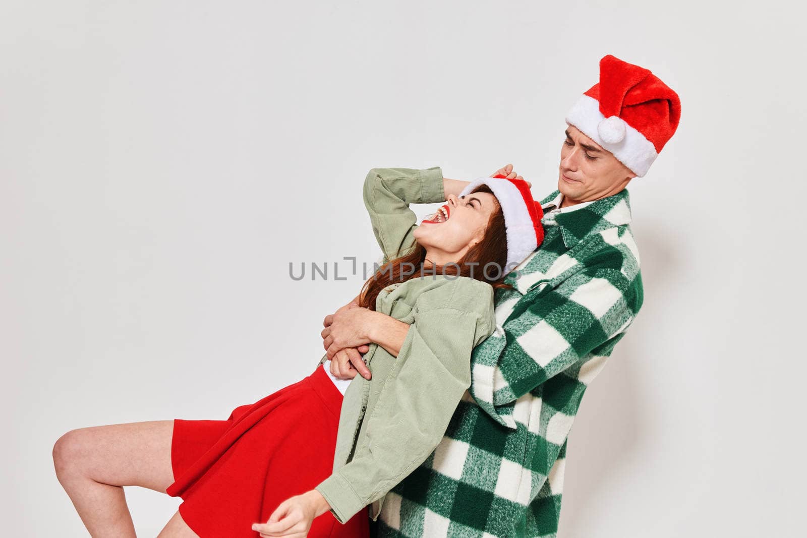 emotional drunk woman next to a man christmas holiday fun Studio by SHOTPRIME