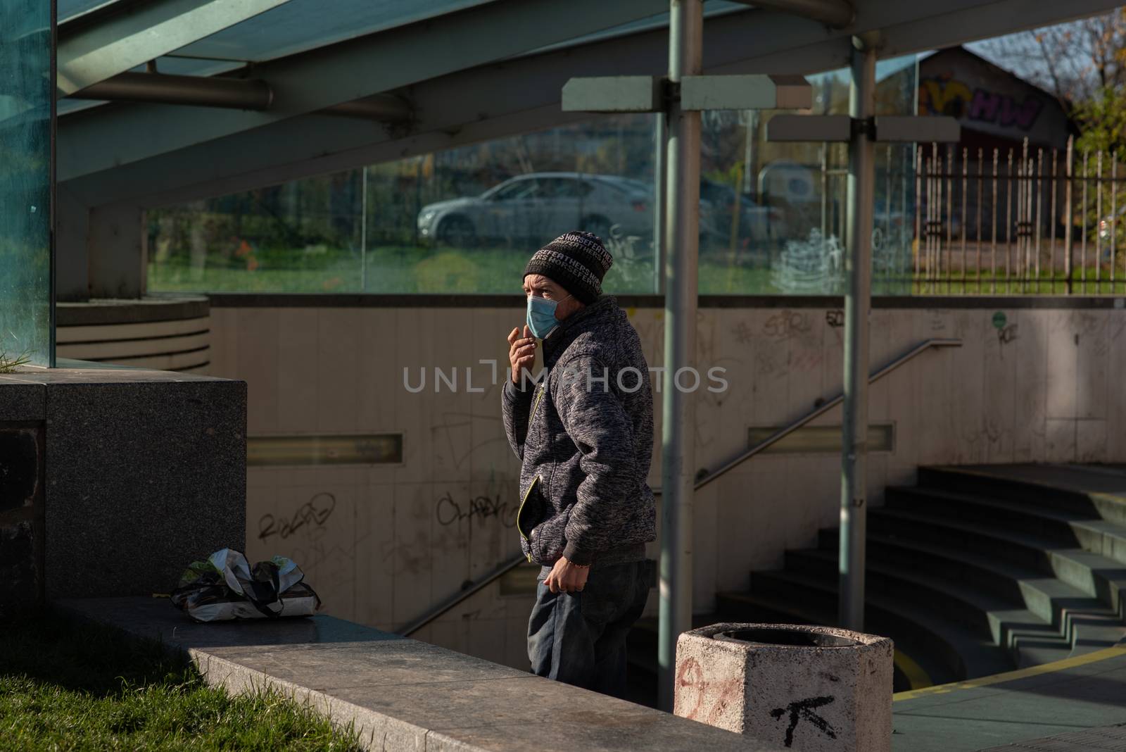 People on a sunny winter day during coronavirus. Last suny days. People are walking, doing some sports or having time to relax. Prague 6, Czech Republic. by gonzalobell