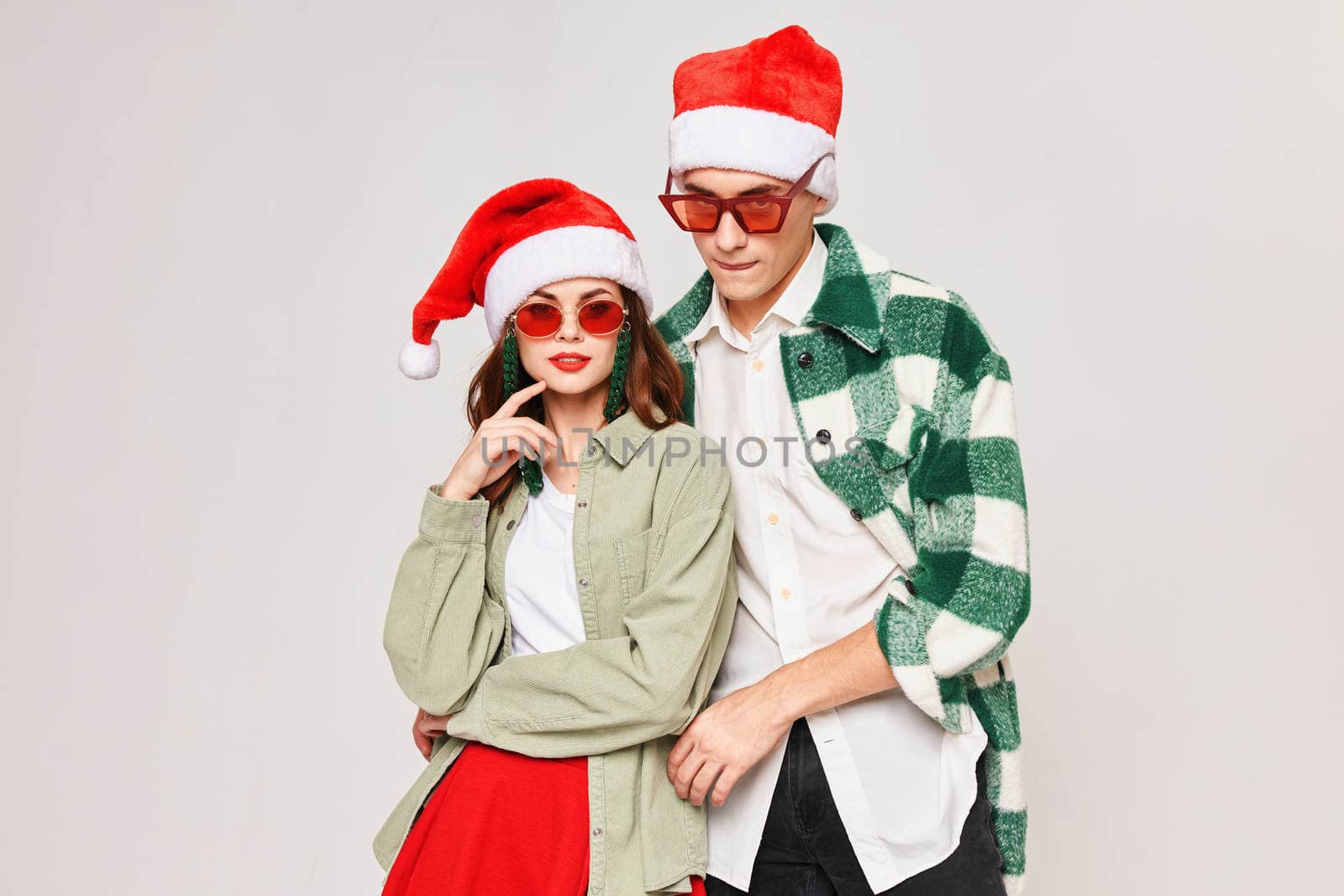 man and woman hugs luxury sunglasses New year fun. High quality photo