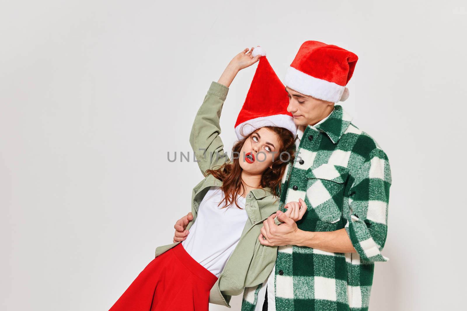 Man holds woman friendship rest fun New year holiday studio. High quality photo