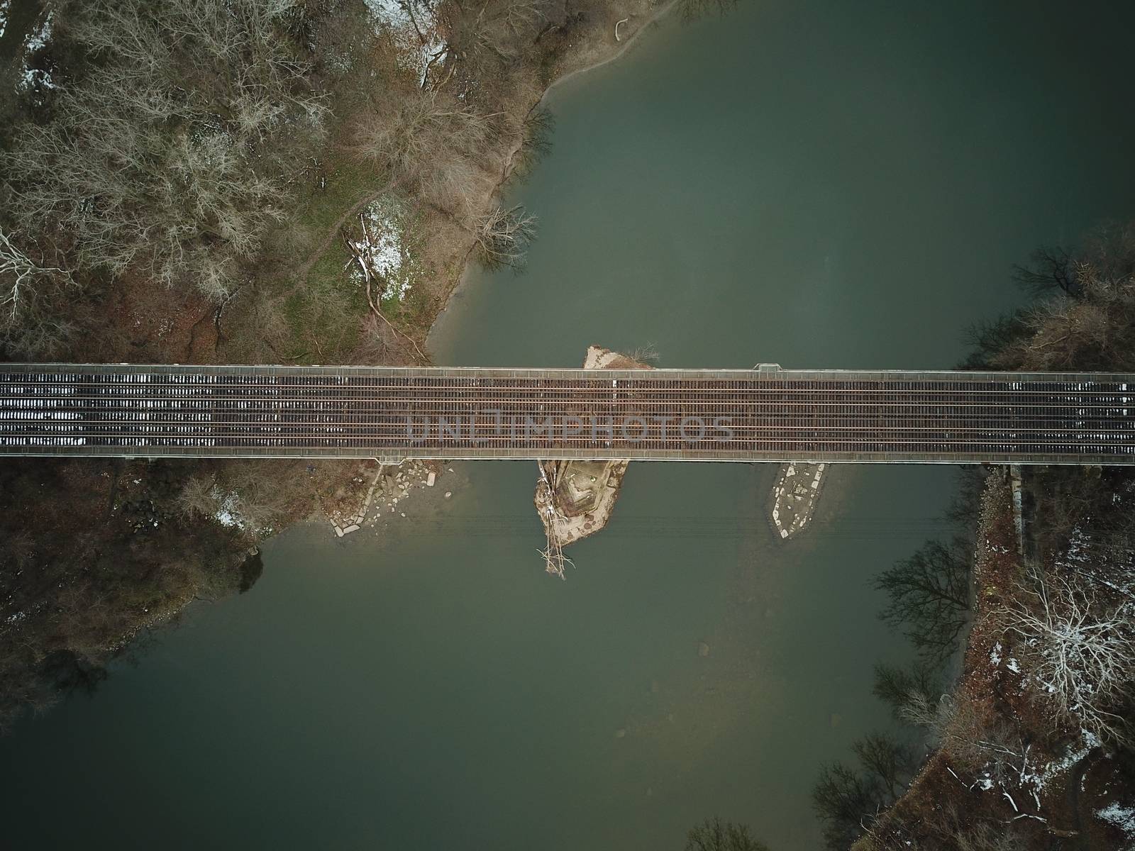 train tracks crossing a river. perfect symmetry by mynewturtle1