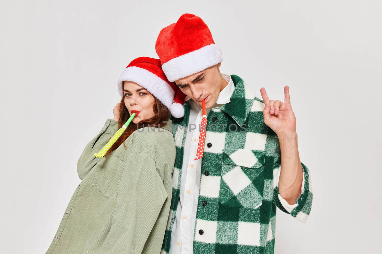 cute man and woman new year fashion clothes holiday fun studio by SHOTPRIME