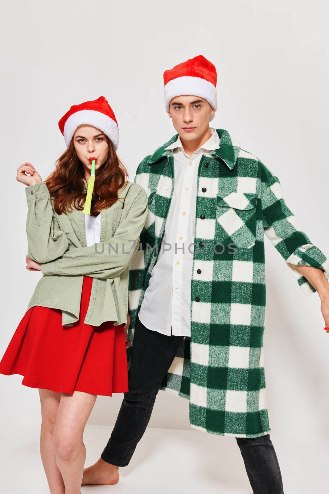 young couple hug lifestyle fashion christmas studio communication by SHOTPRIME