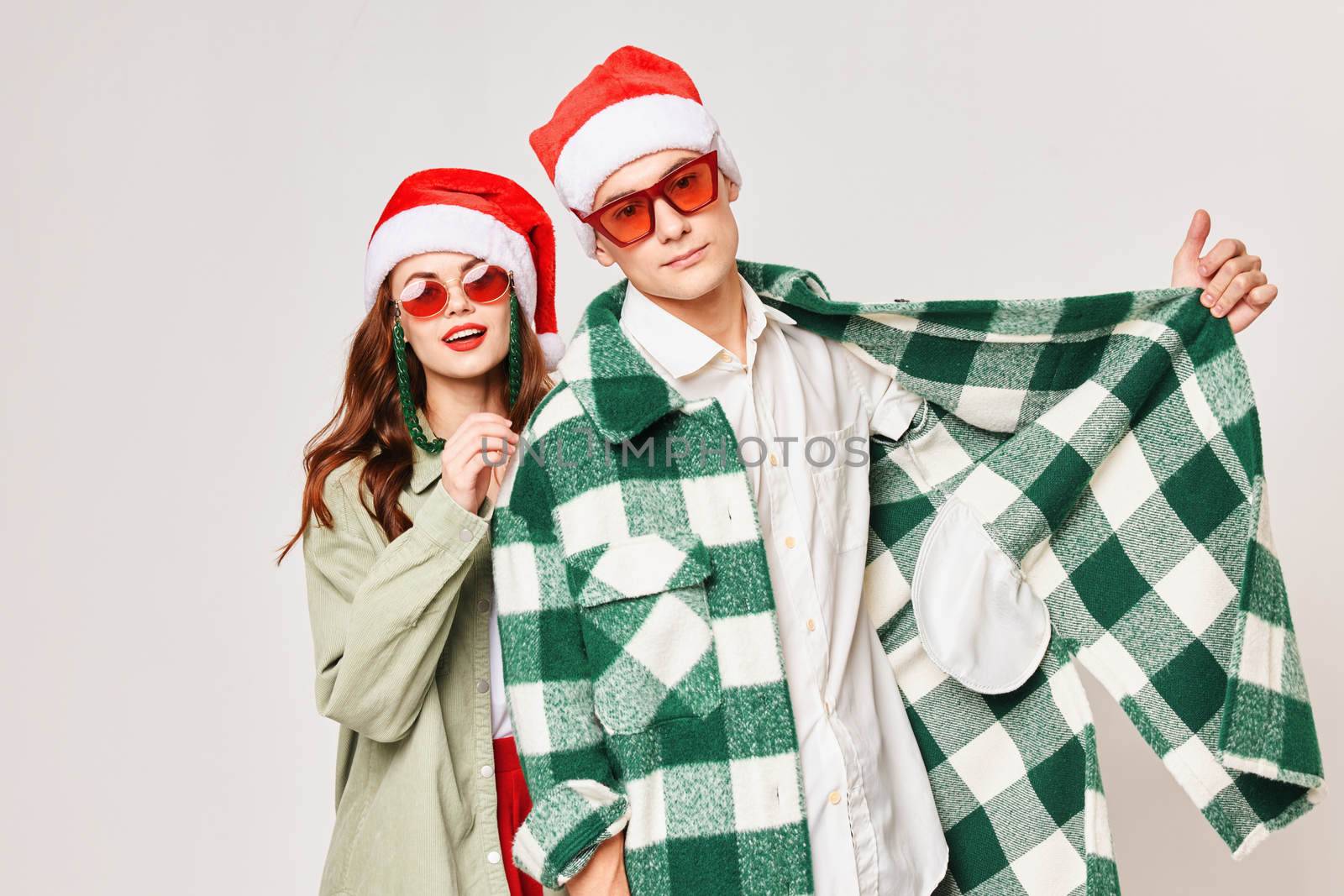 Young married couple studio Merry Christmas holiday together romance. High quality photo