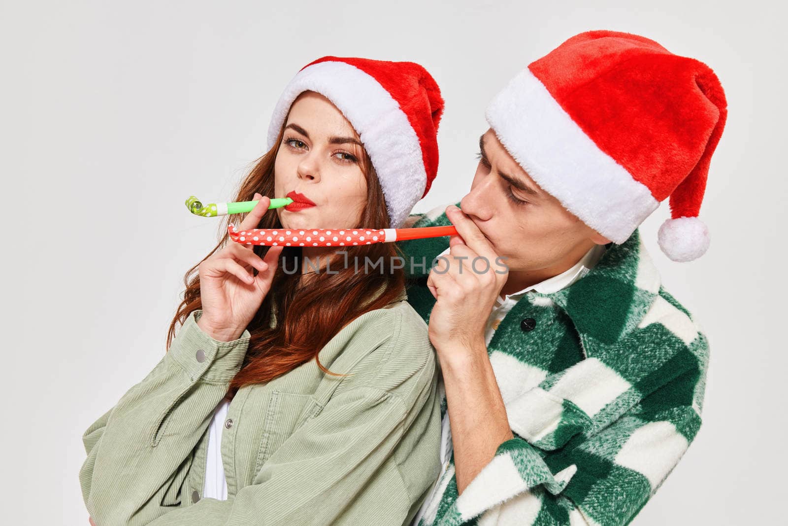 Man and woman festive mood fun Christmas New Year fashion. High quality photo