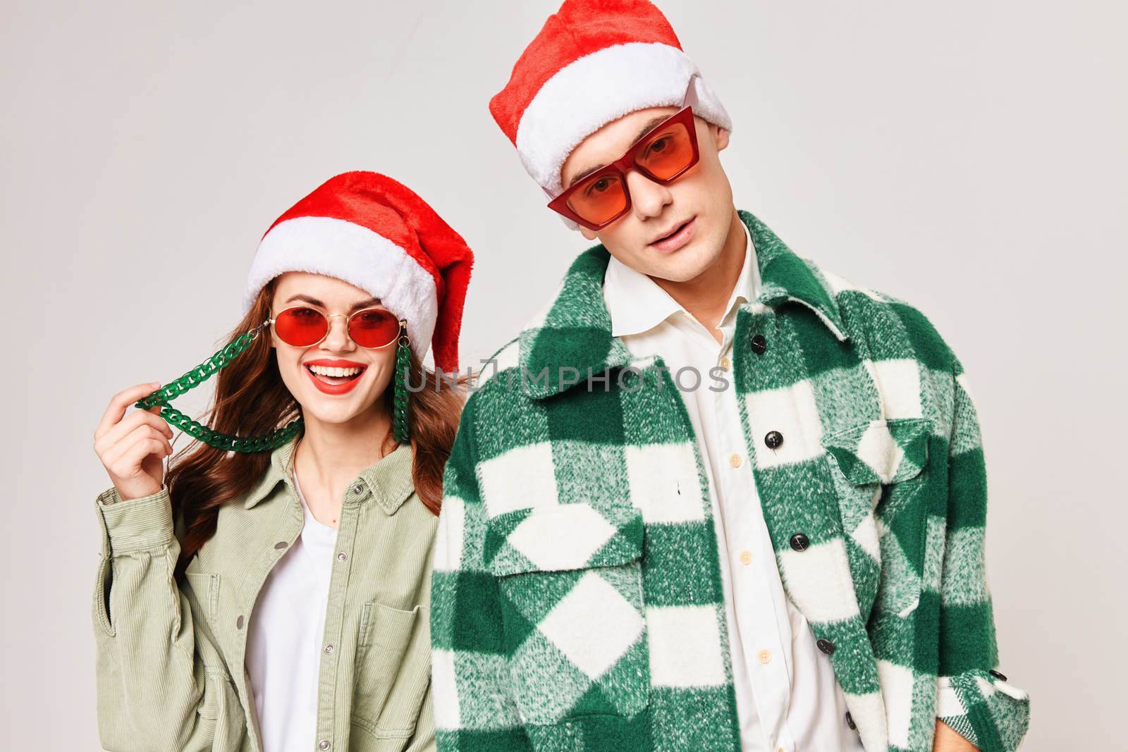 cute young couple wearing black glasses fashion new year clothes Studio christmas holiday by SHOTPRIME