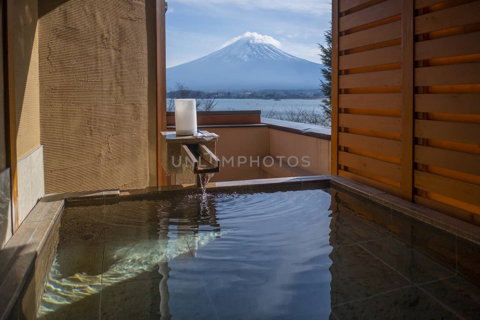 Outdoor hot-spring bath with the beautiful view of Mountain Fuji by Surasak