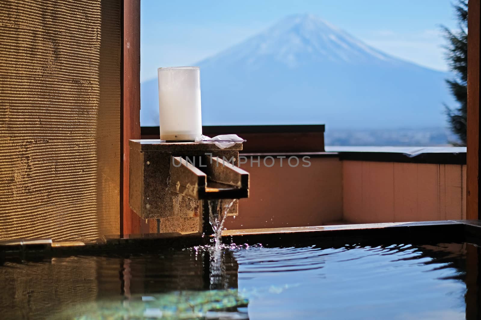Outdoor hot-spring bath with the beautiful view of Mountain Fuji by Surasak