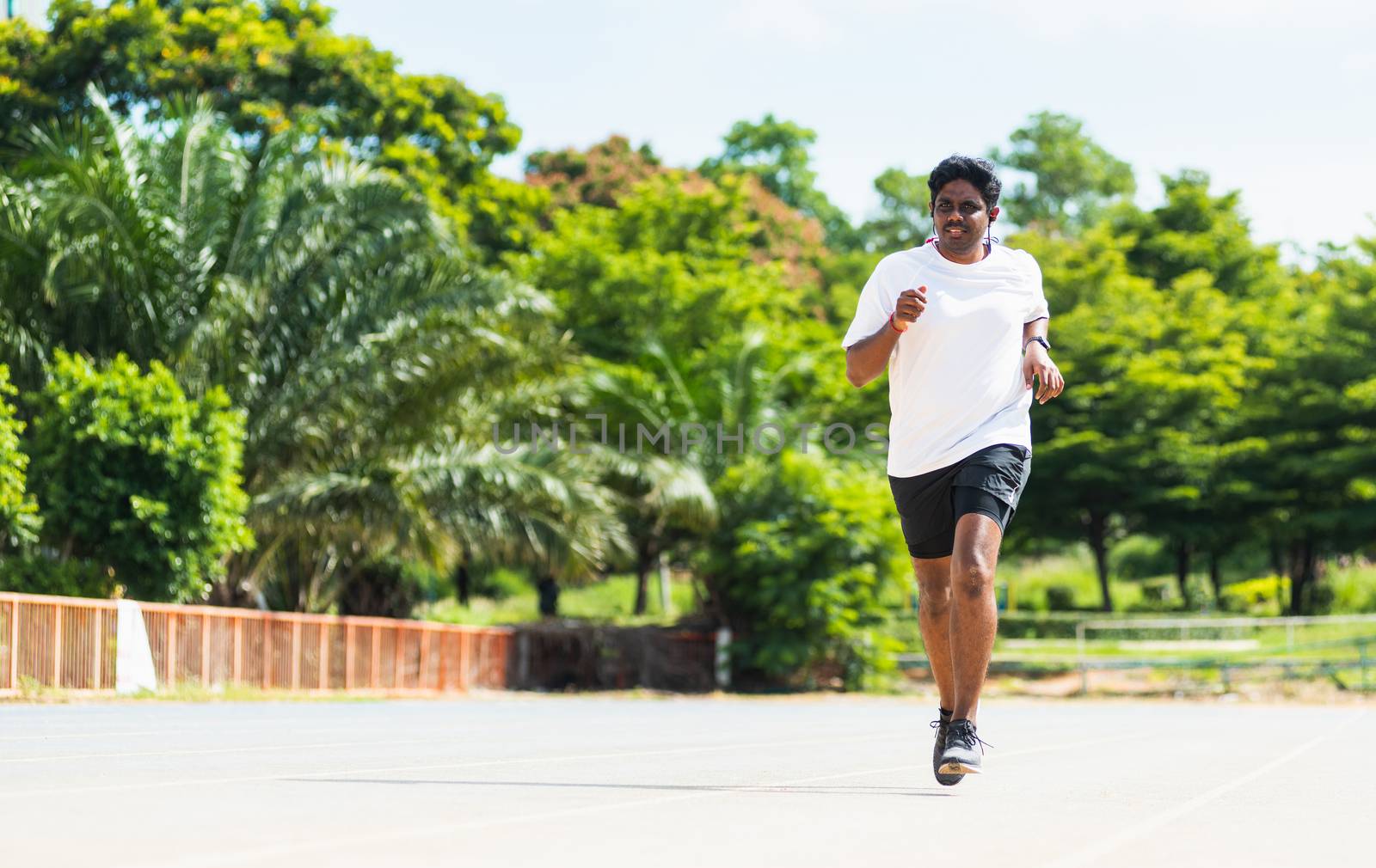 sport runner black man wear feet shoe active running training by Sorapop