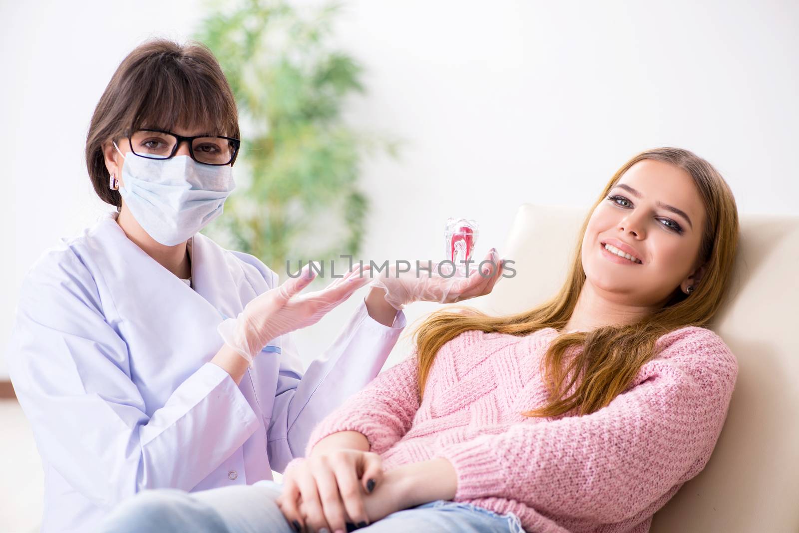 Woman patient visiting dentist for regular check-up