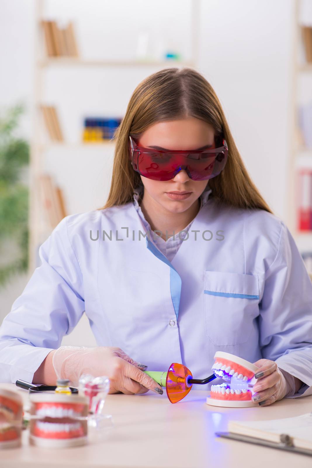 Dentistry student practicing skills in classroom