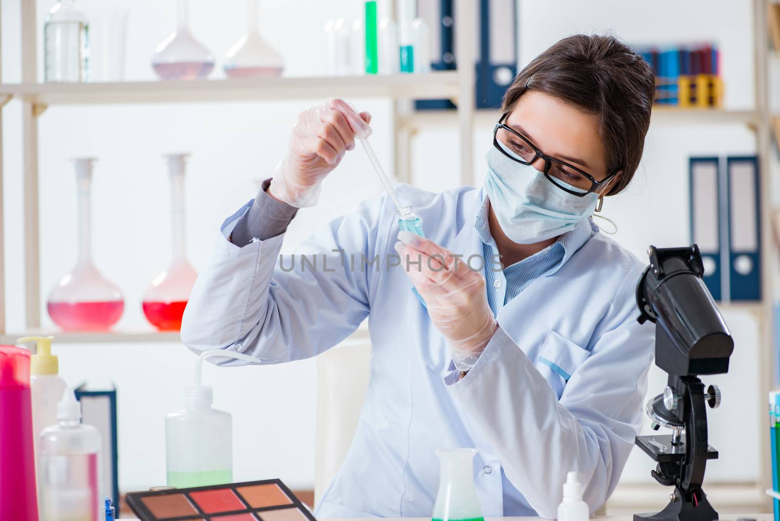 Lab chemist checking beauty and make-up products