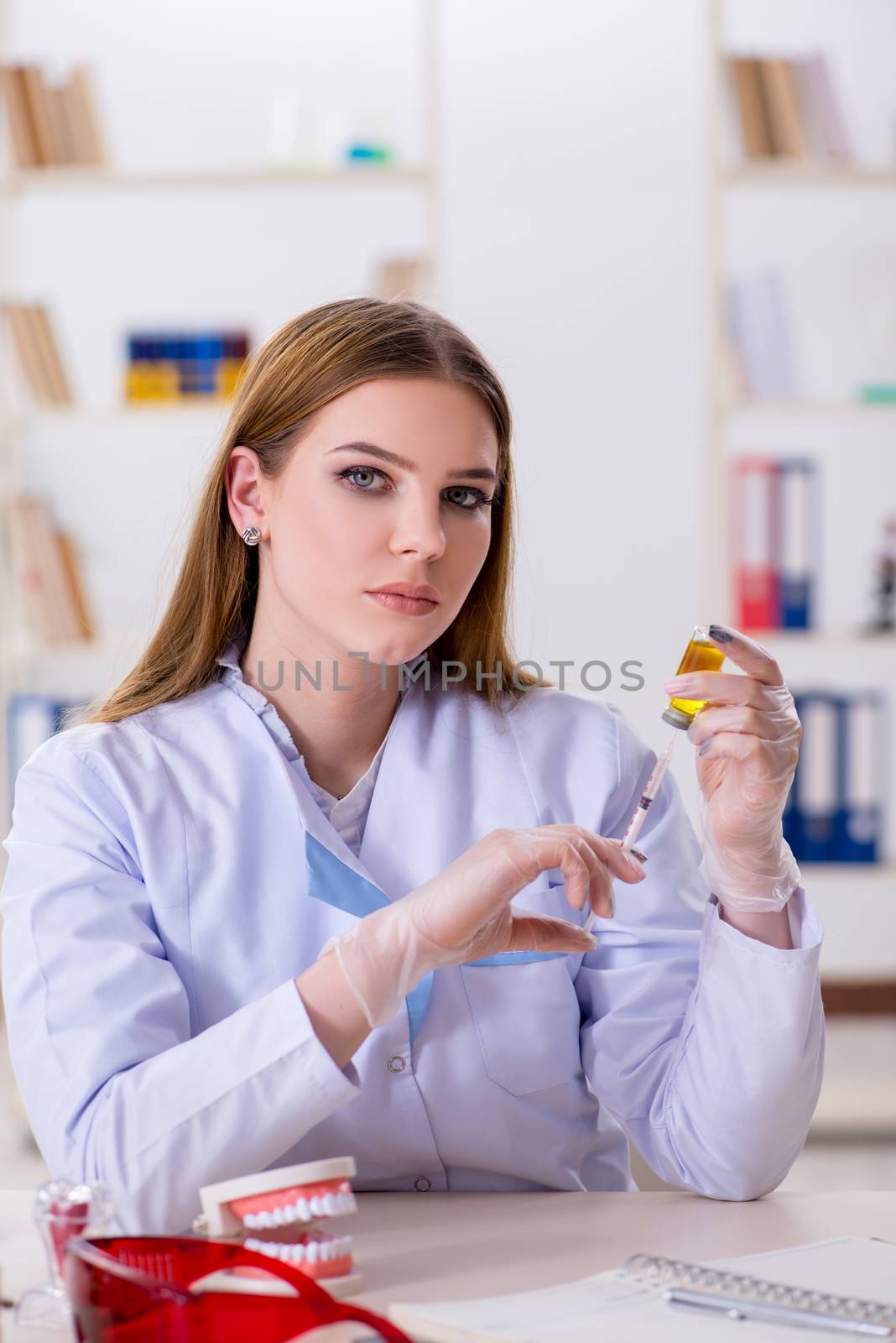 Dentistry student practicing skills in classroom