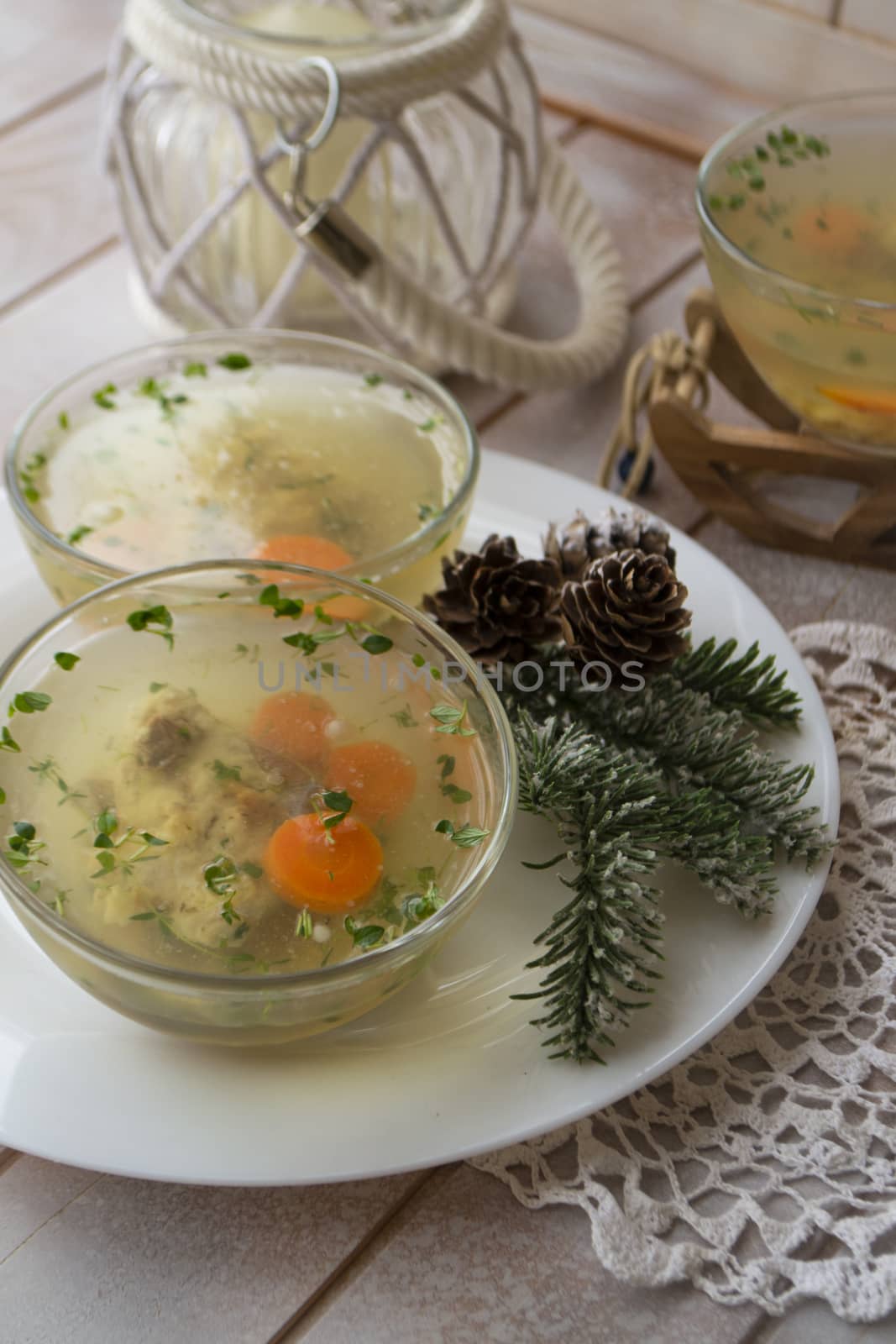 Jellied fish with egg and vegetables on an shabby table