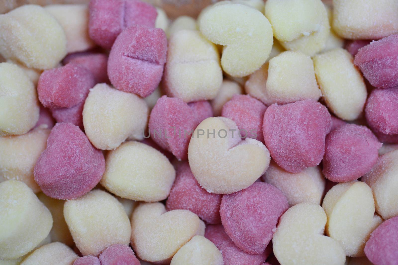 Red and white heart shaped uncooked gnocchi