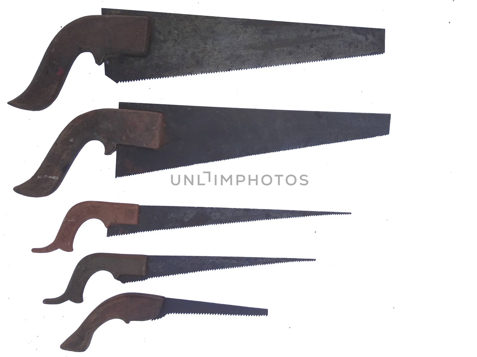 image of Different sizes of old hand saw isolated on white background.