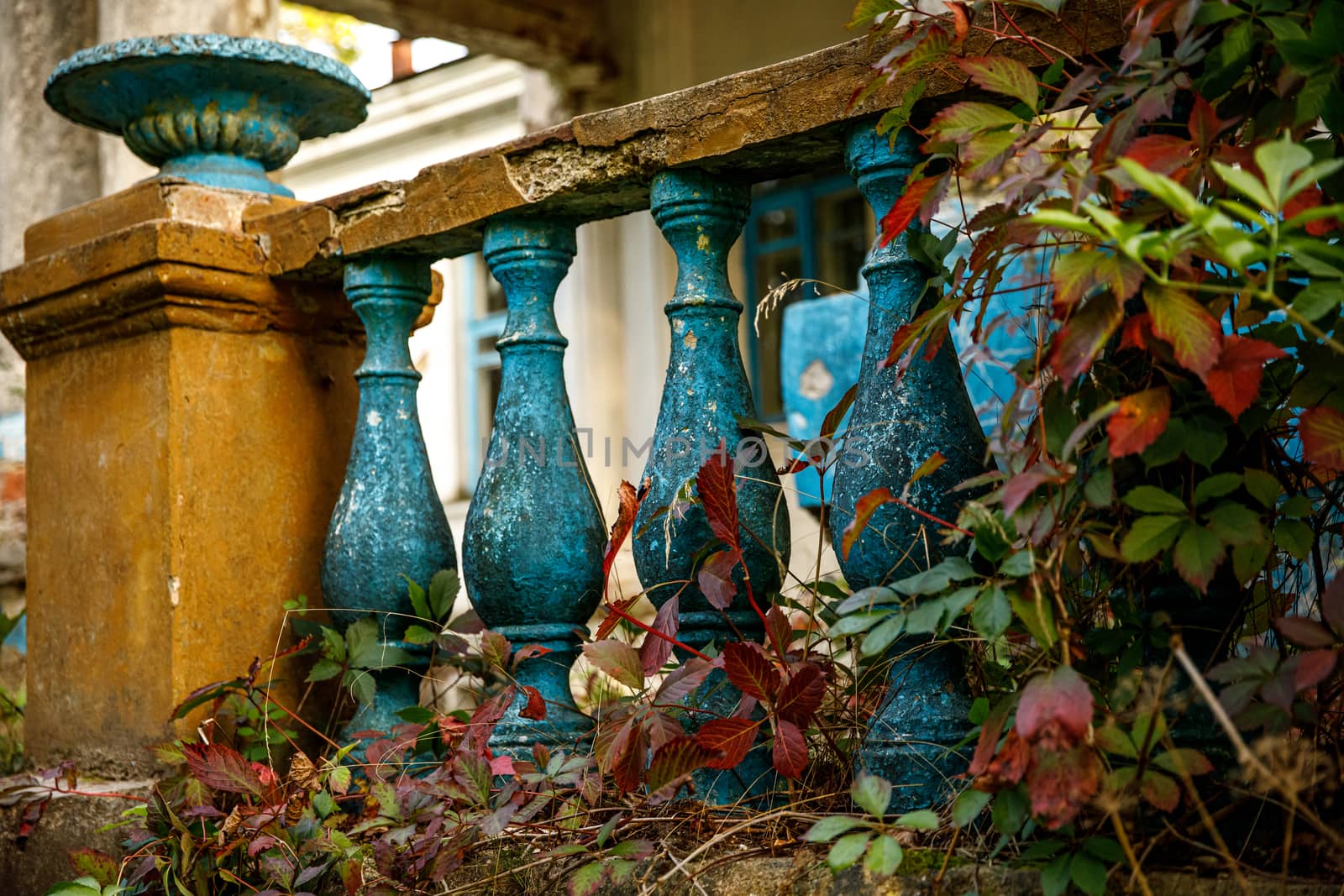 Blue stone railings on the porch of the palace. Balustrades in autumn