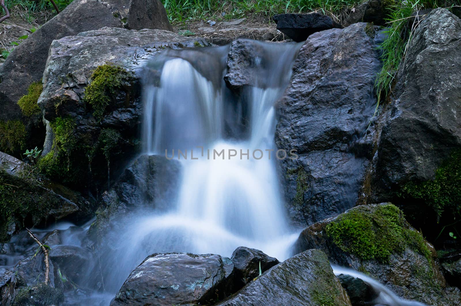 A small waterfall, photographed on a long exposure.