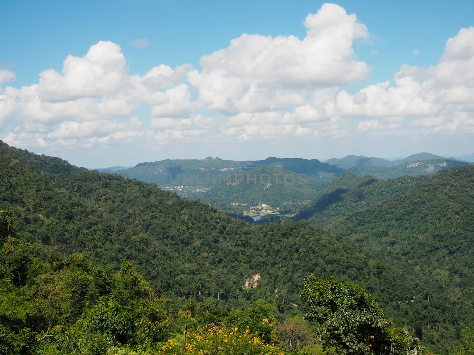 Landscape of green mountains and bright blue sky