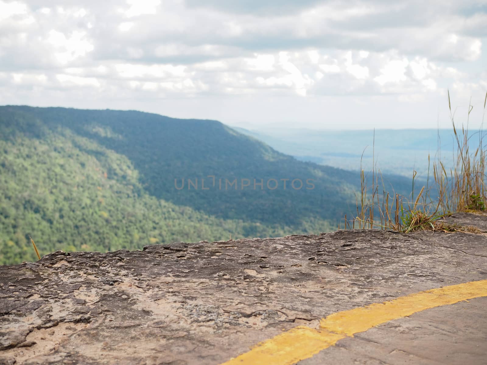 Product display area Rocky cliff On the background are mountains by Unimages2527