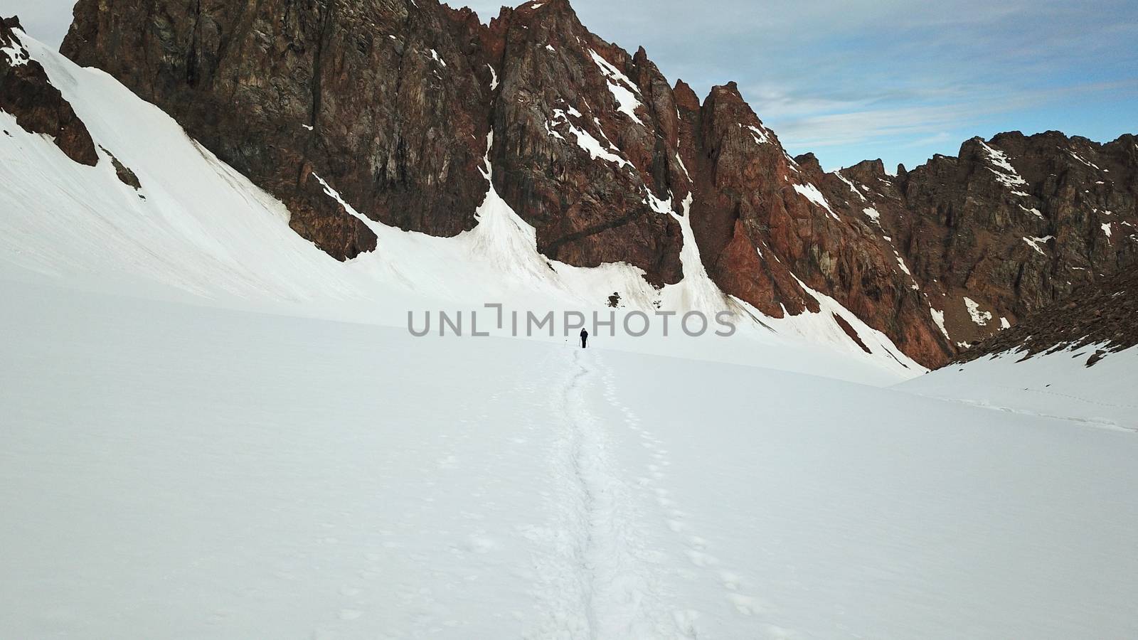 A large group of climbers climb to the top. by Passcal