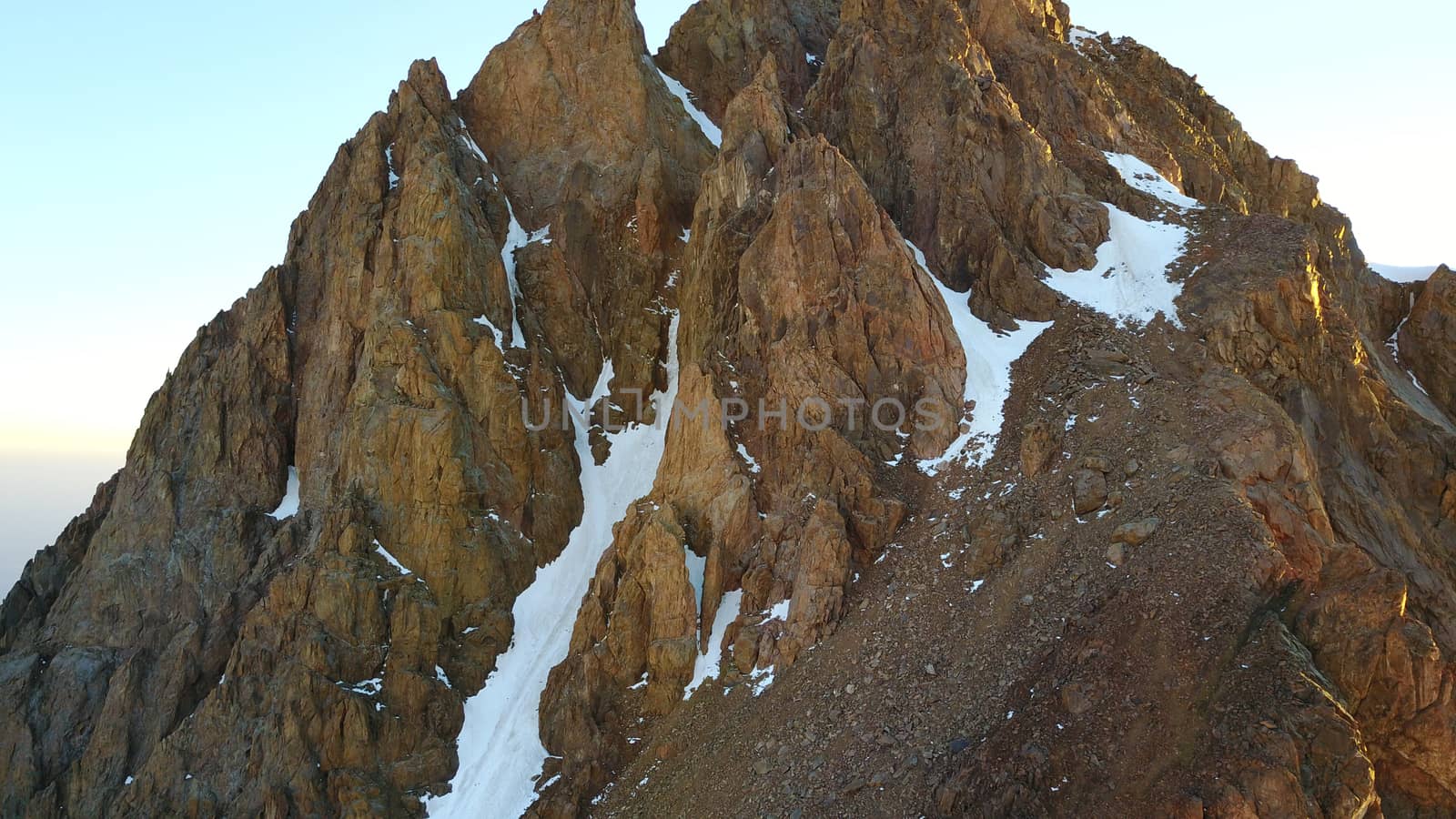 Huge snow mountains. View from a drone. by Passcal