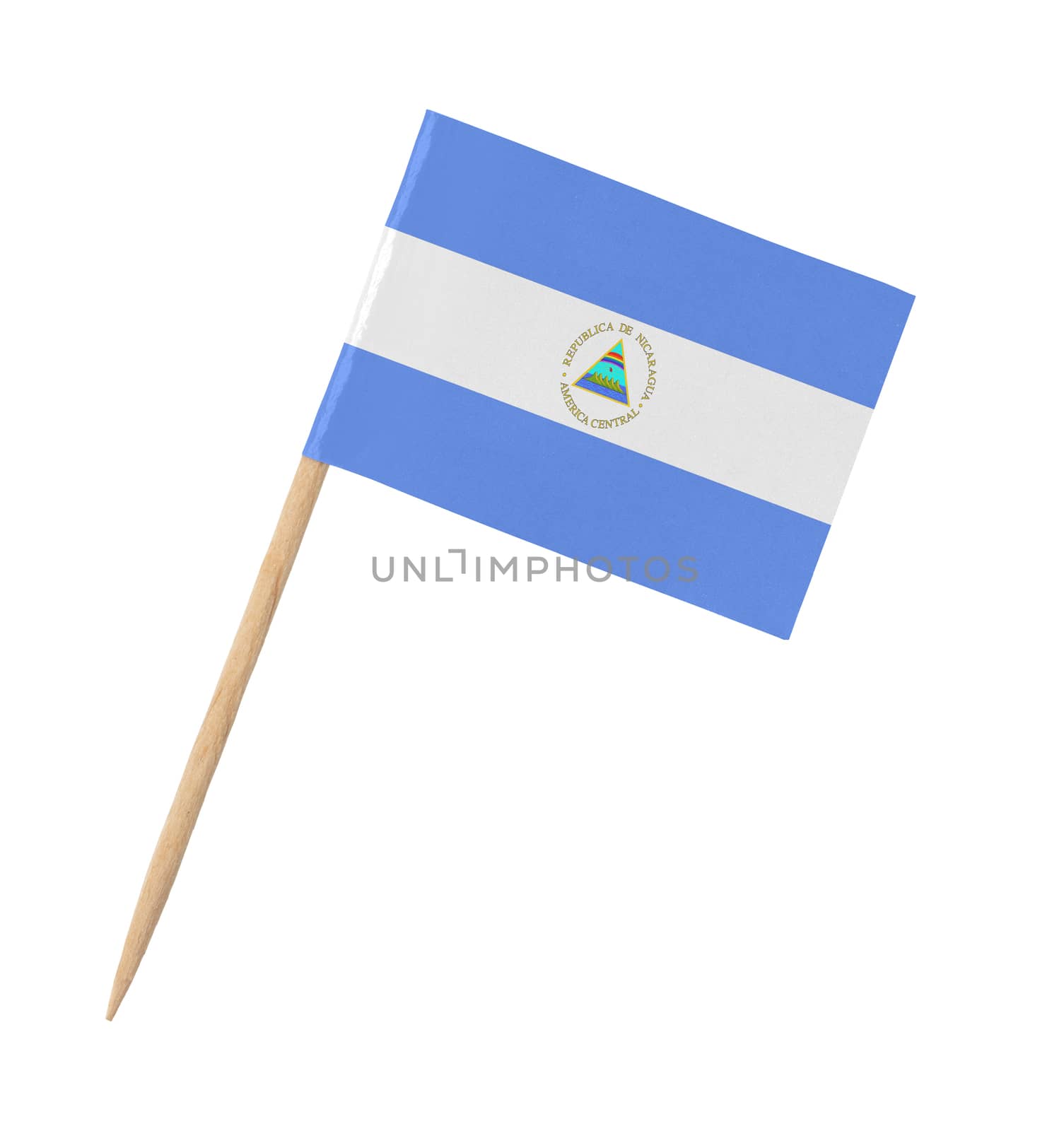 Small paper flag of Nicaragua on wooden stick, isolated on white