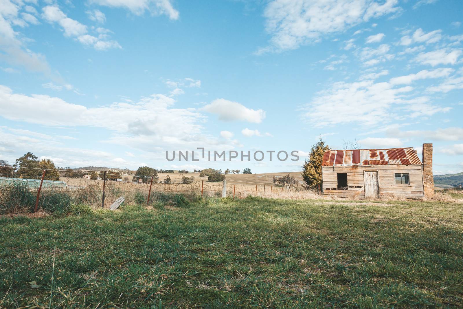 Old rustic timber homestead with rusting corrugated iron roof by lovleah