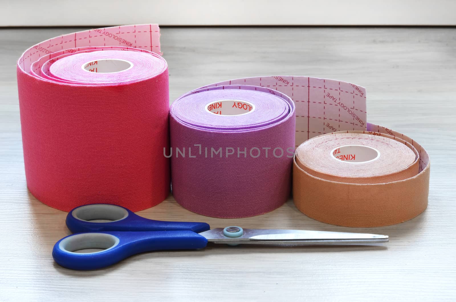 Kinesiological tape rolls. Anti-pain taping for athletes for weight loss, anti-wrinkle by lucia_fox