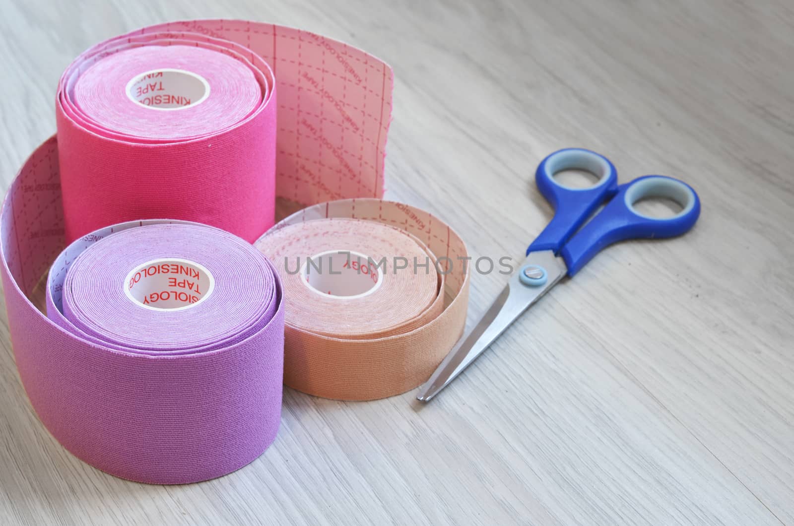 Kinesiological tape rolls. Anti-pain taping for athletes for weight loss, anti-wrinkle.