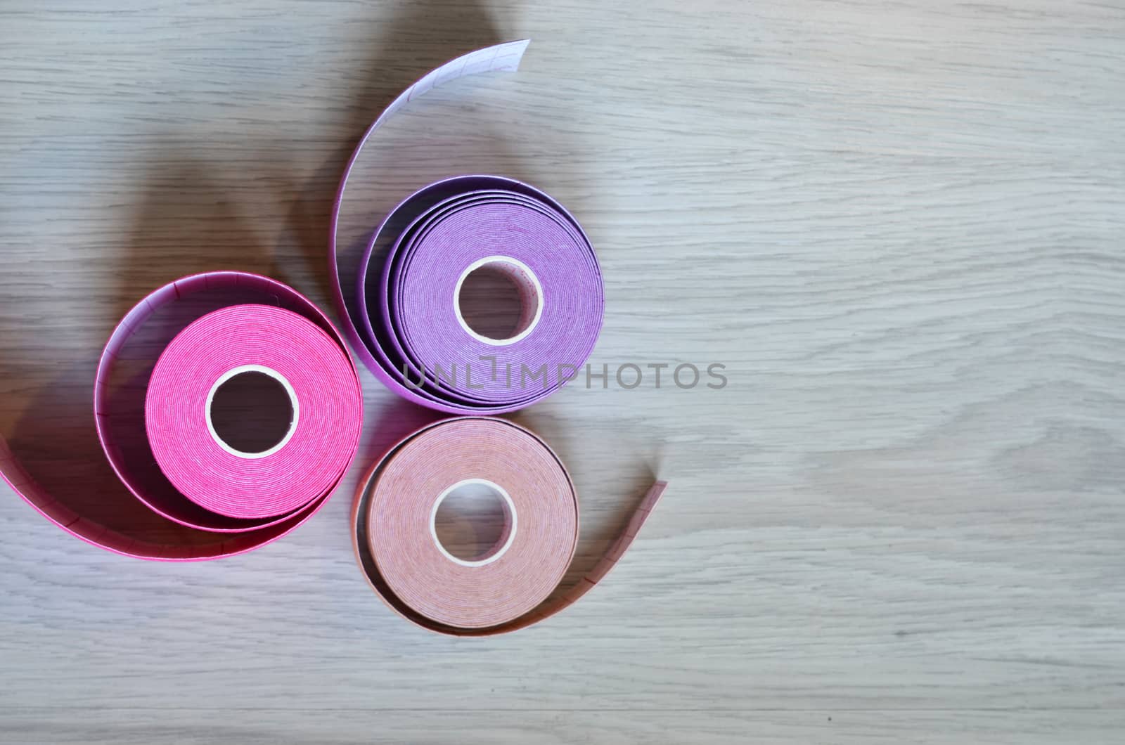 Kinesiological tape rolls. Anti-pain taping for athletes for weight loss, anti-wrinkle.