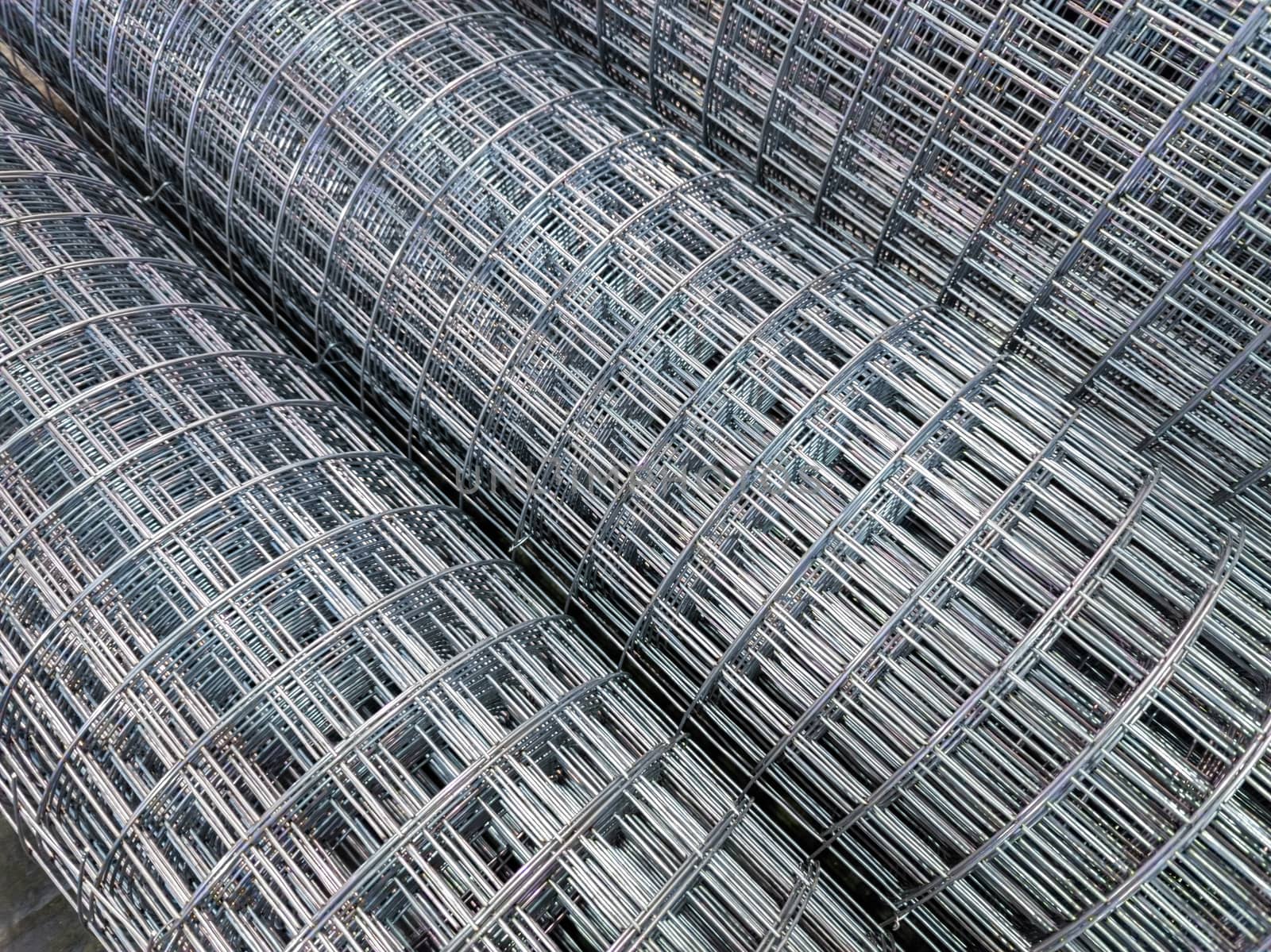 zync plated wired square mesh rolls close-up full frame background with selective focus
