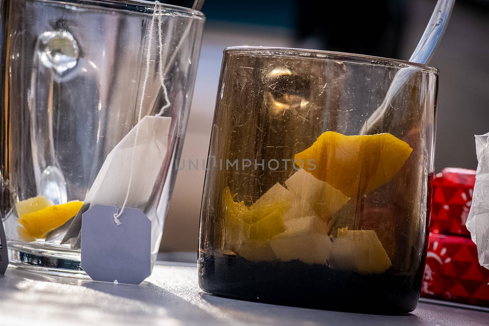 Transparent mug with tea. Brewing tea in a bag.