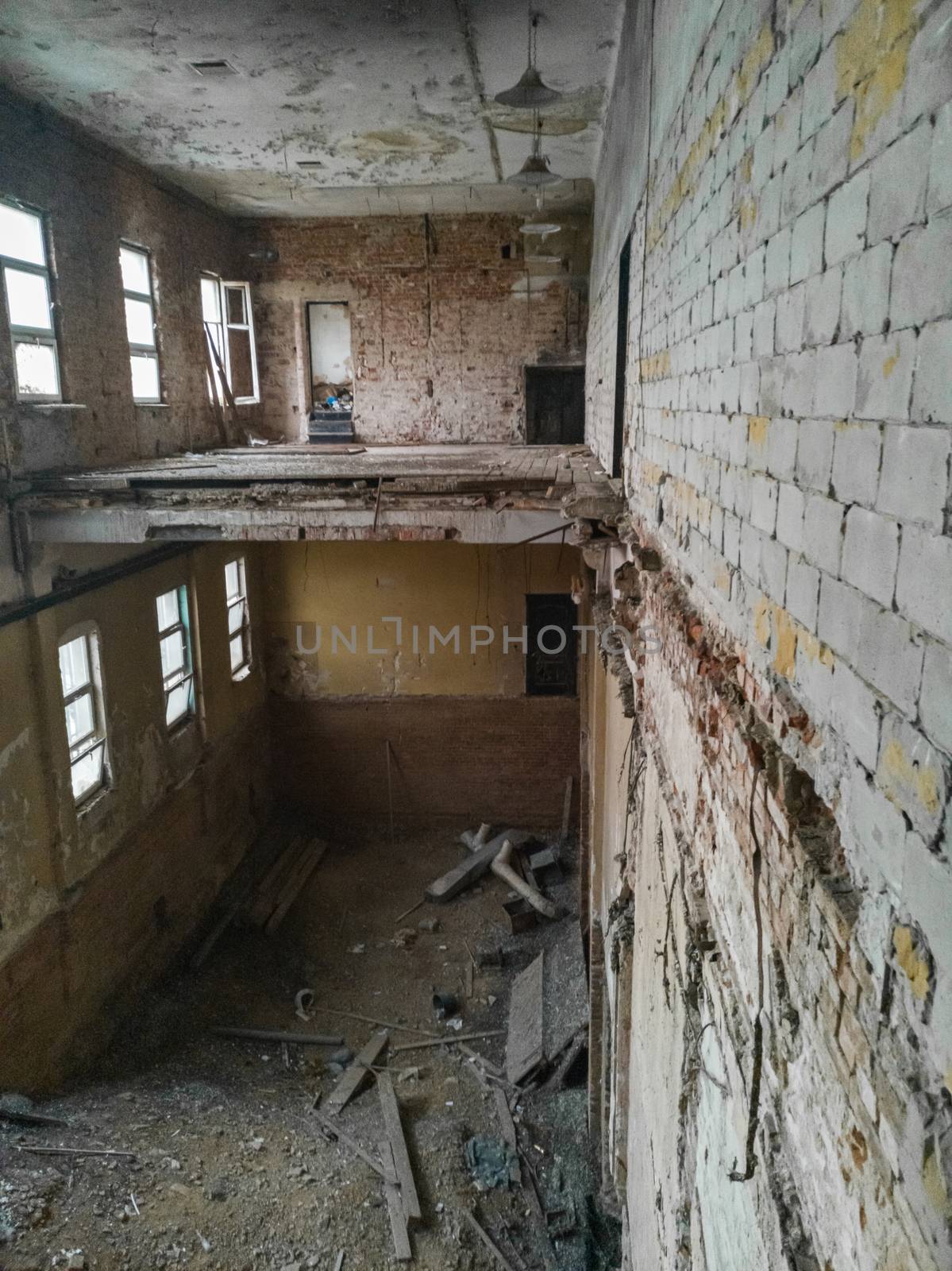 Urban exploration of ruins of old building with floor without floor