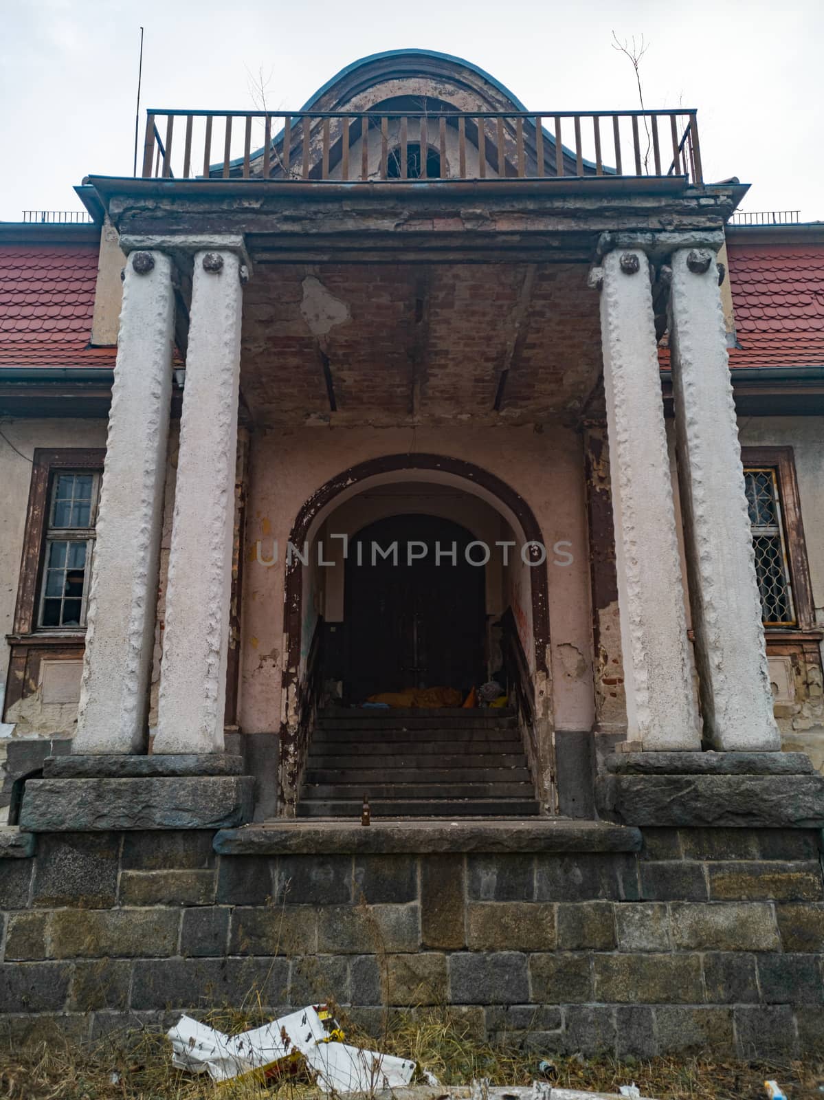 Front facade of ruins of old residence by Wierzchu