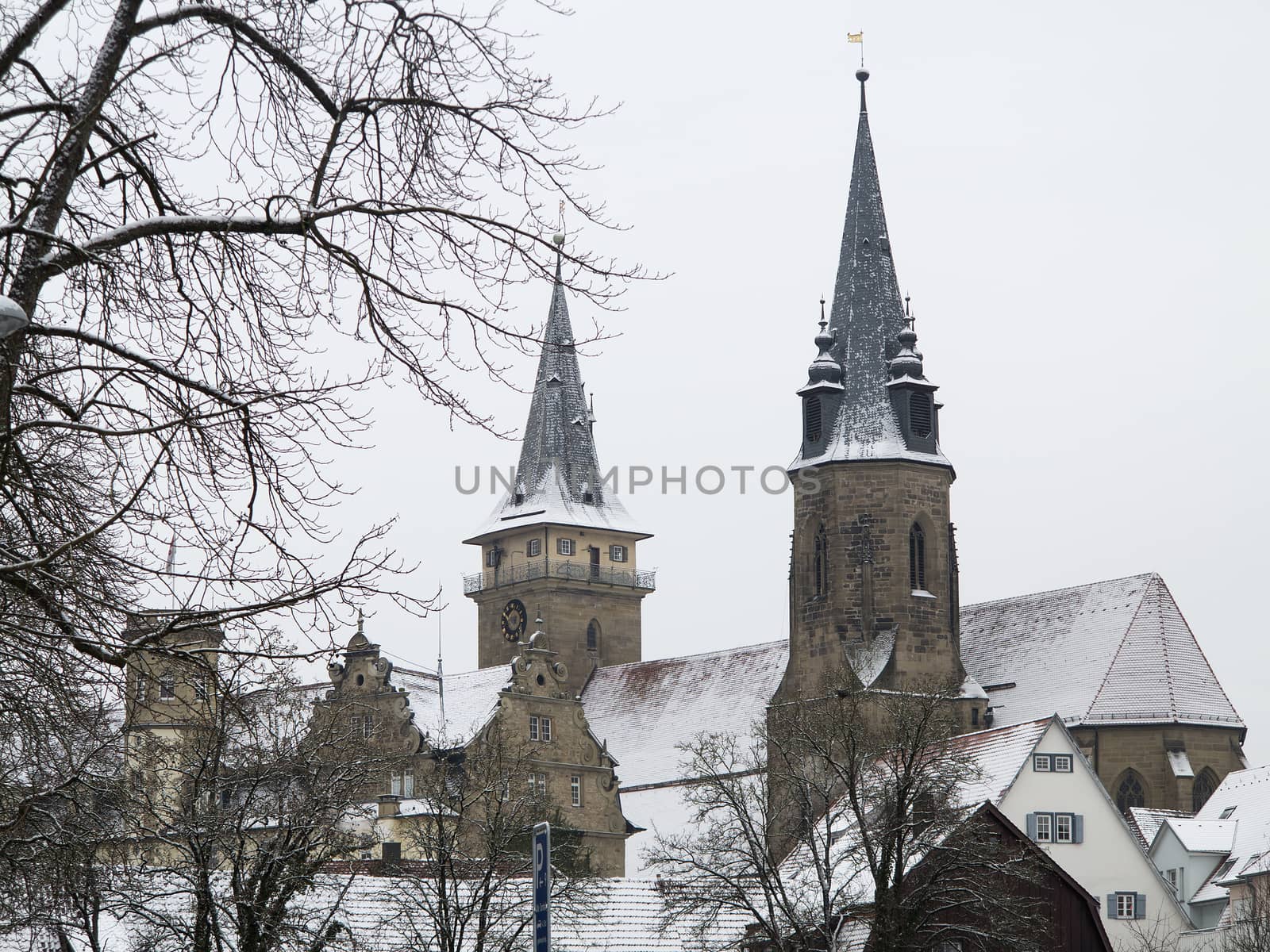Cityview of the town Oehringen in Germany in winter by Kasparart