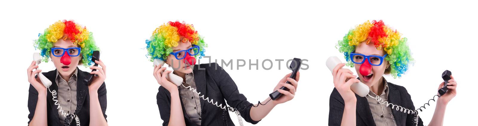 Businessman with clown wig isolated on white