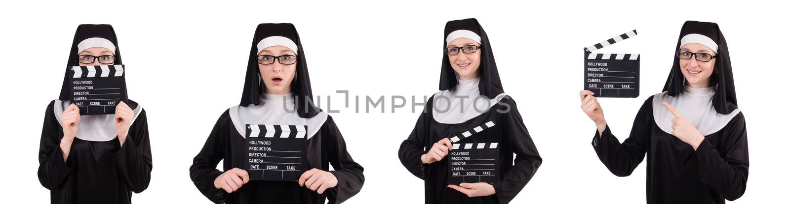 Nun with movie board isolated on white by Elnur