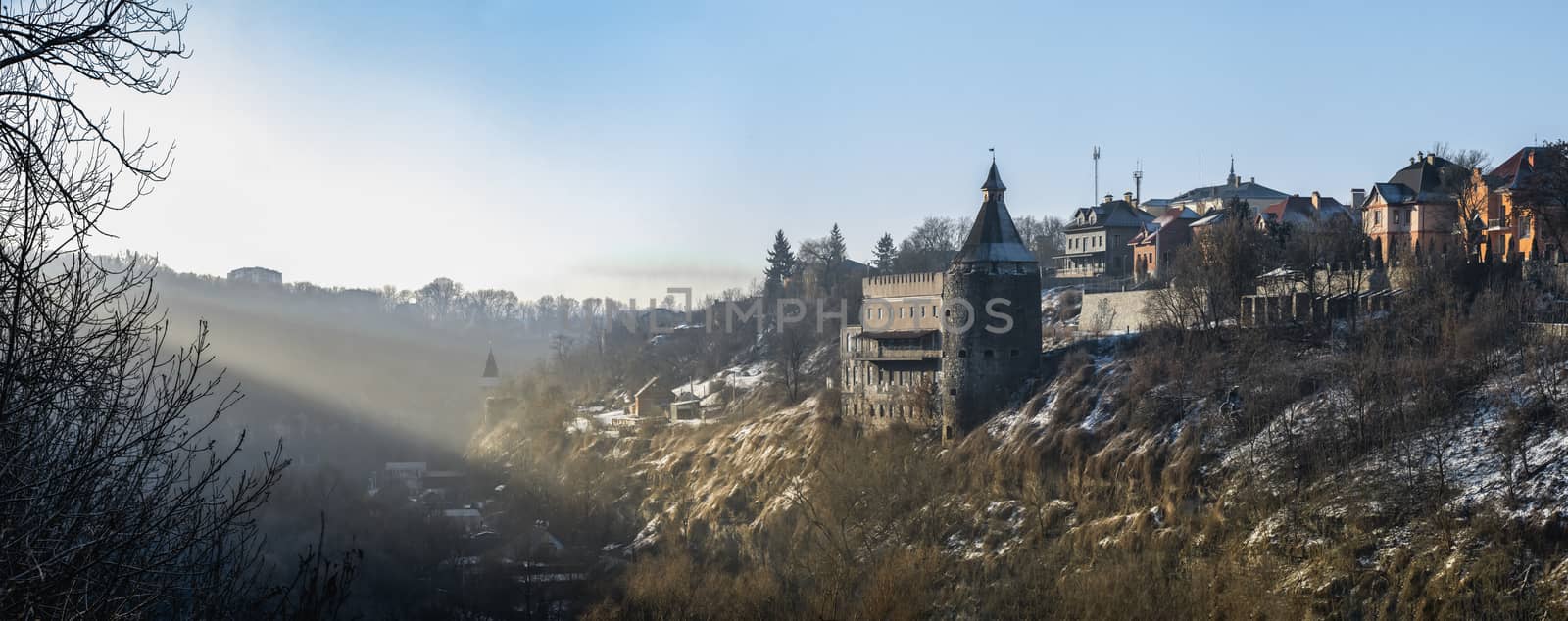 Kamianets-Podilskyi, Ukraine 01.07.2020. Smotrytsky canyon and river around the Kamianets-Podilskyi fortress on a sunny winter morning