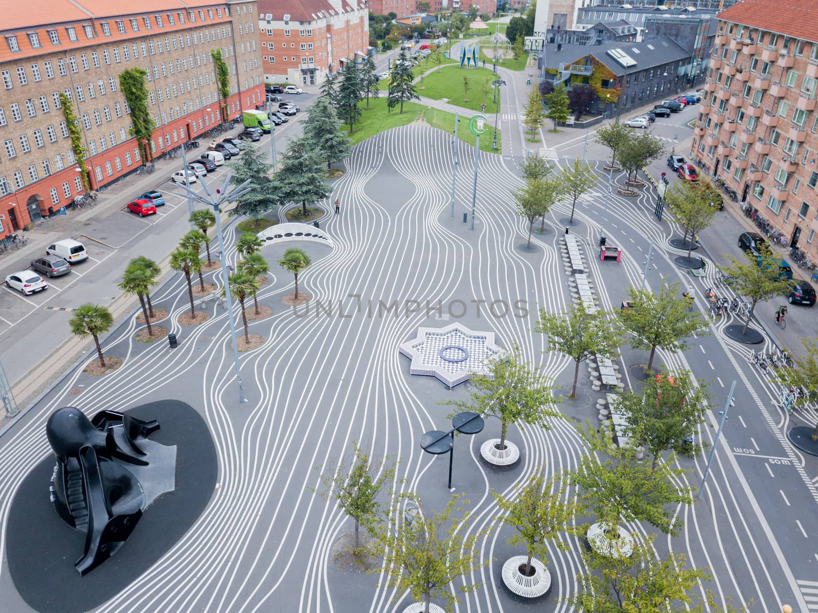 Copenhagen, Denmark - August 23, 2019: Aerial drone view of Superkilen Park in Norrebro district. Designed by the arts group Superflex.