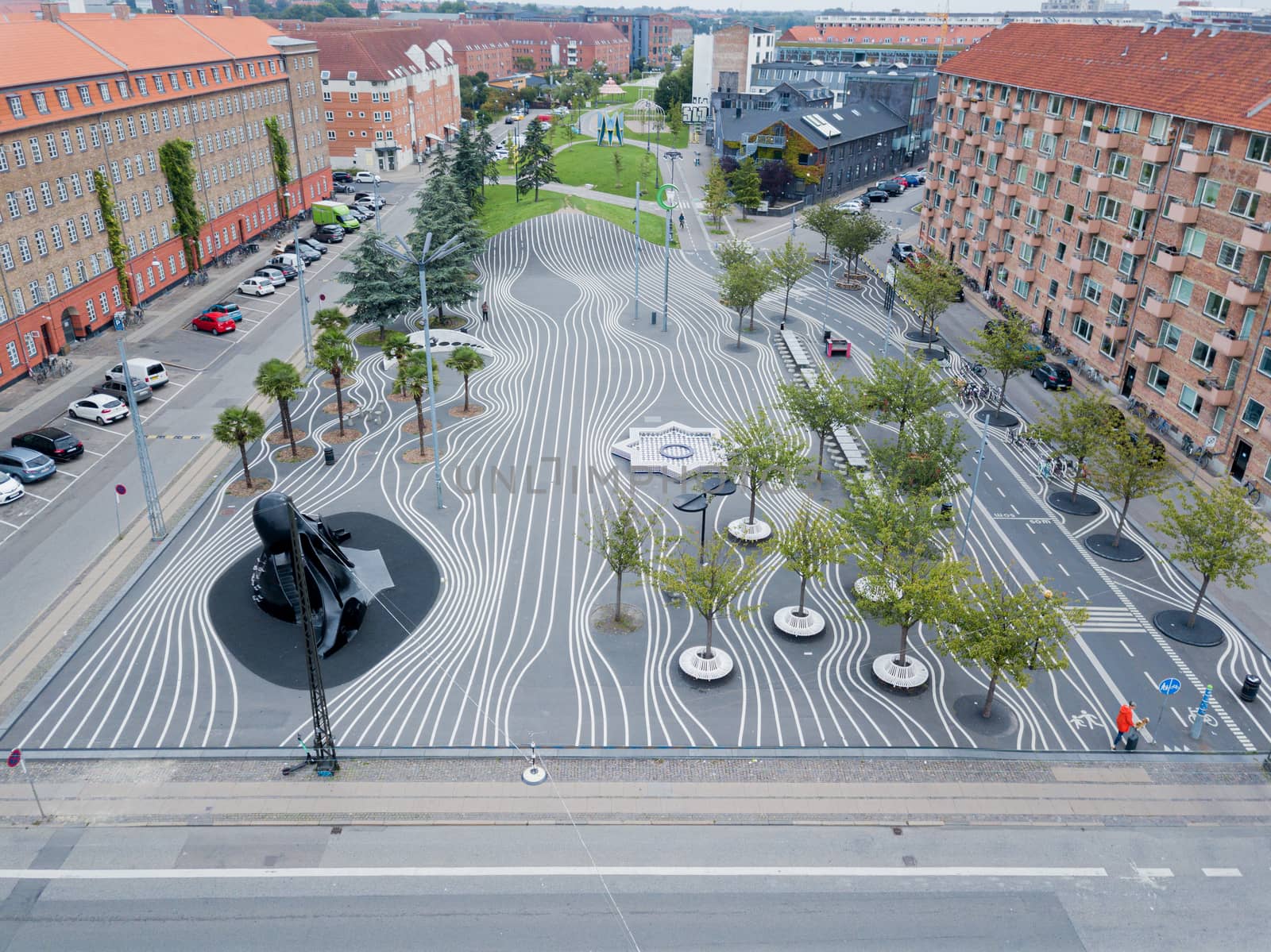 Copenhagen, Denmark - August 23, 2019: Aerial drone view of Superkilen Park in Norrebro district. Designed by the arts group Superflex.