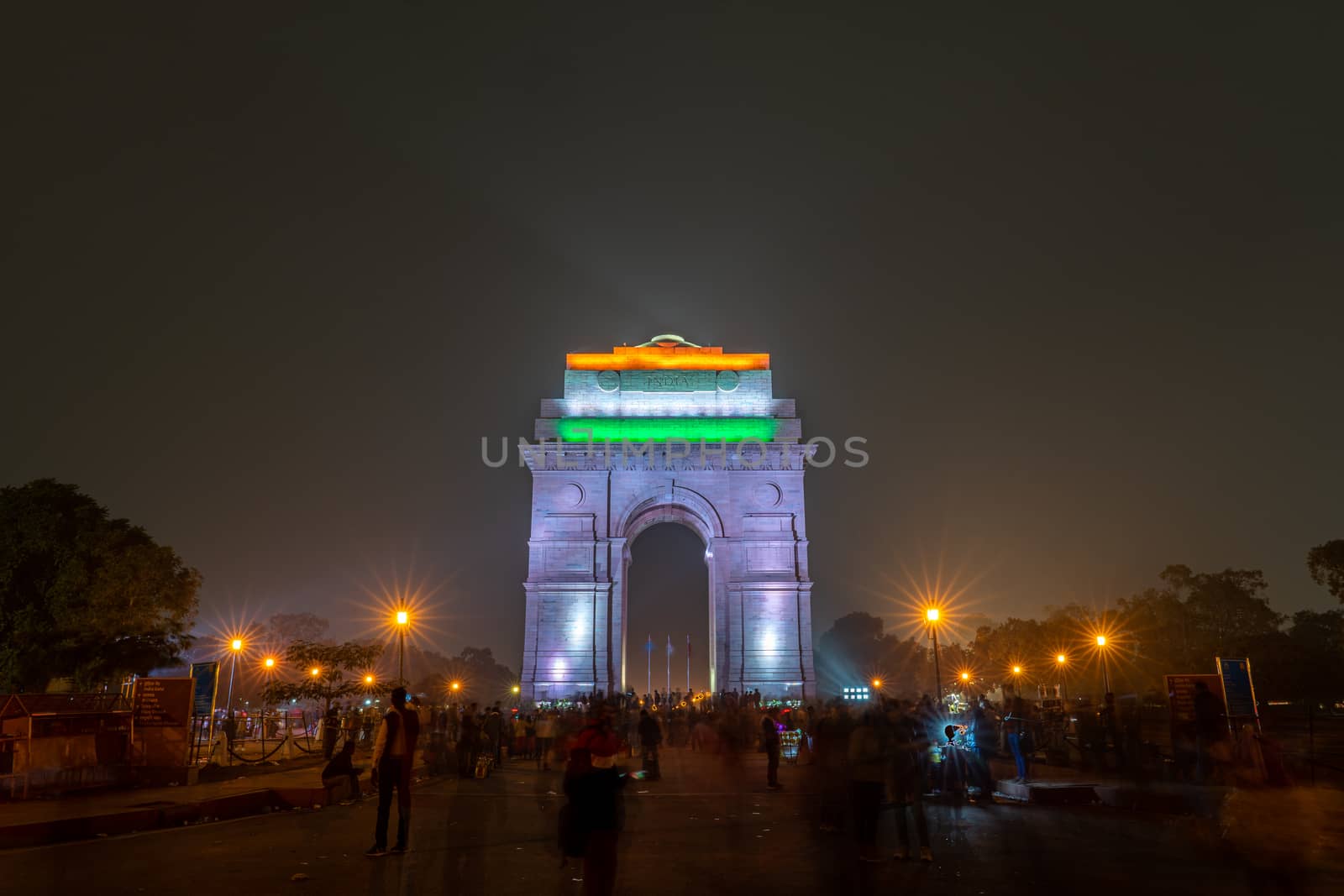 New Delhi, India - December 13, 2019: People in front of the illuminated India Gate at night.