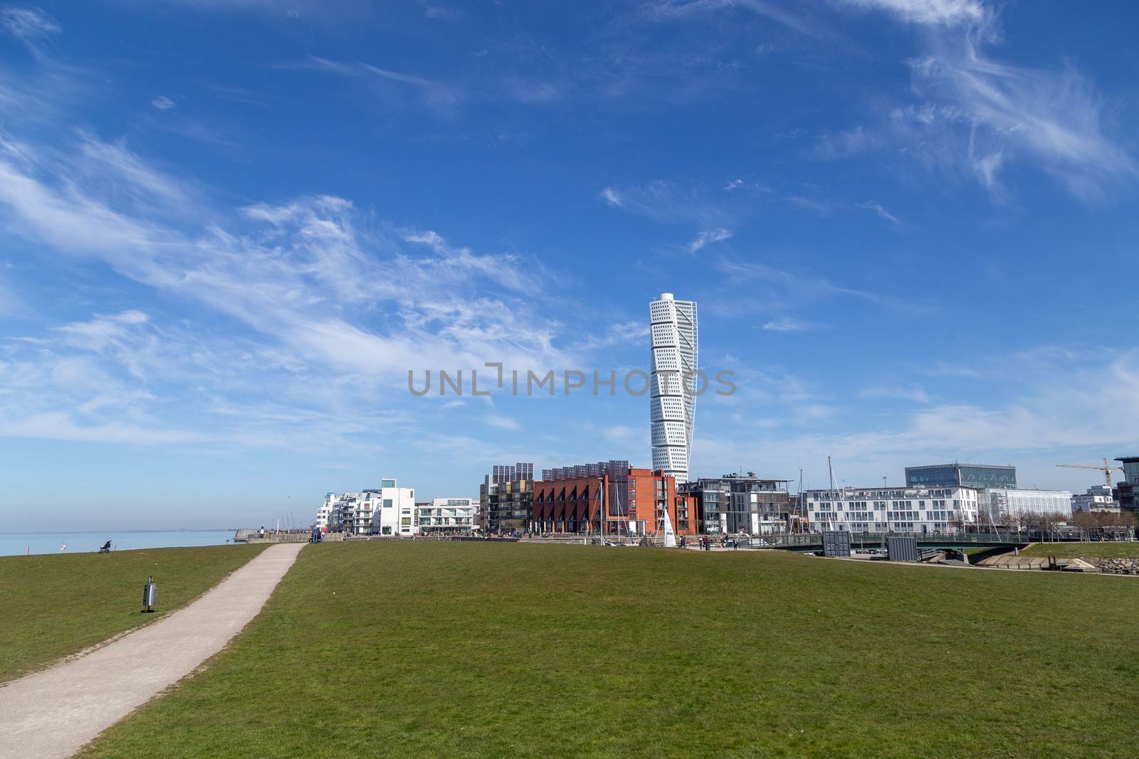 Malmo, Sweden - April 20, 2019: Malmo skyline with the modern residential skyscraper Turning Torso designed by Spanish architect Santiago Calatrava.