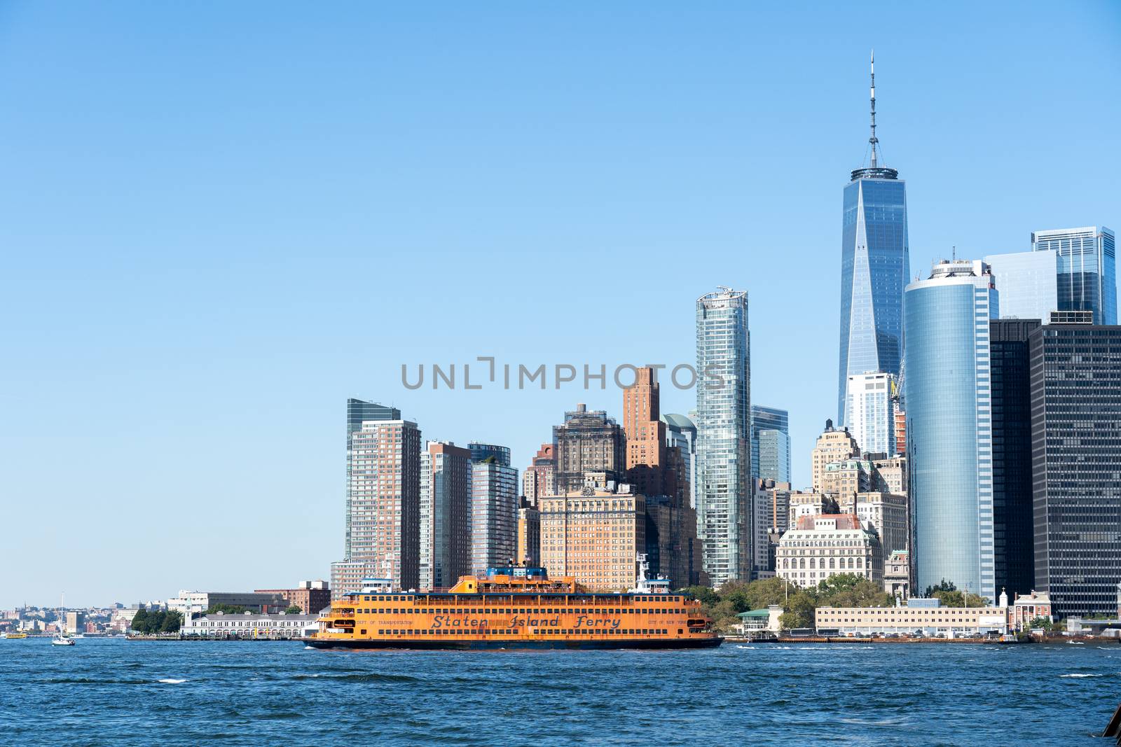 Staten Island Ferry and Lower Manhattan Skyline by oliverfoerstner