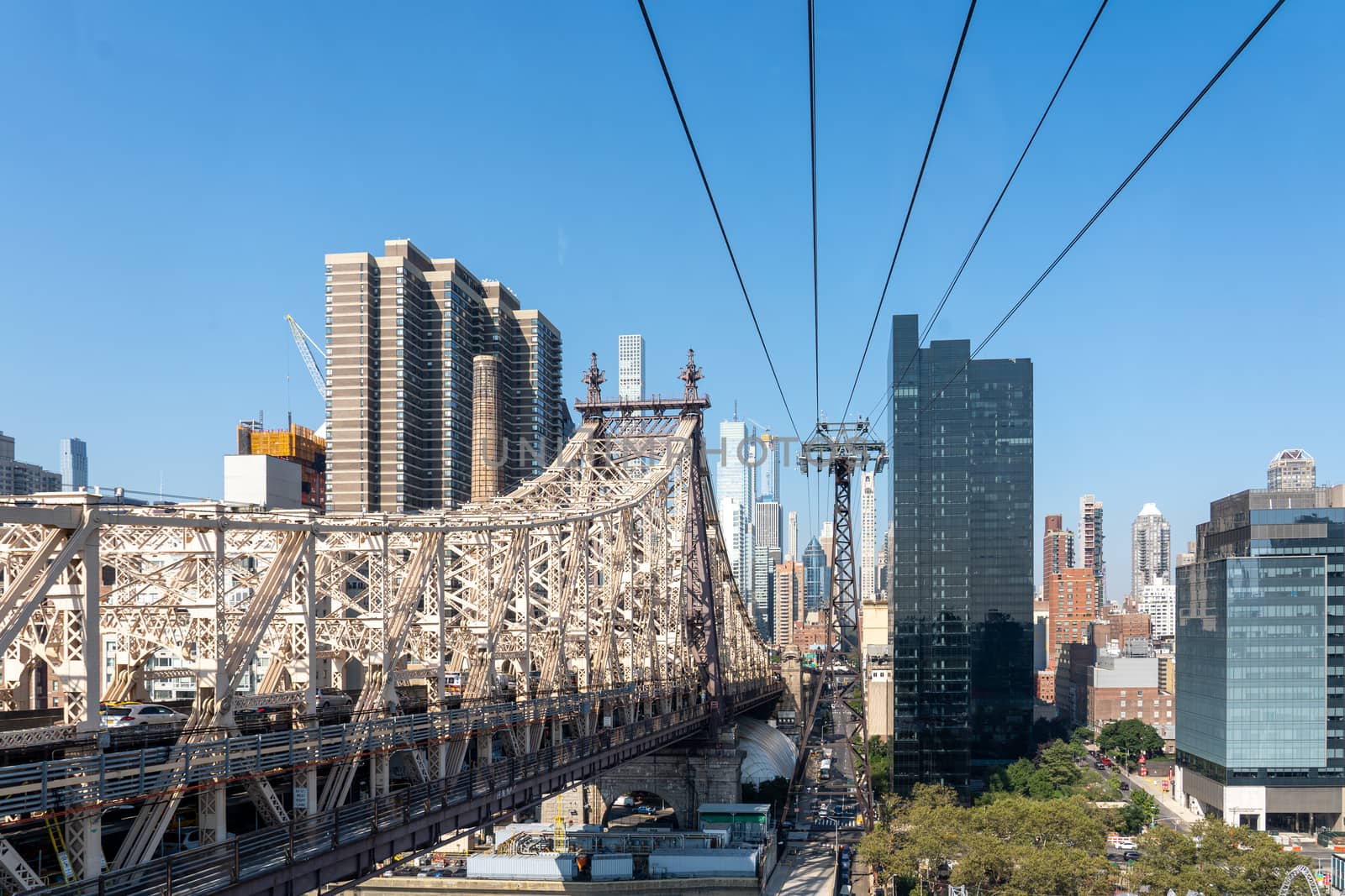 NYC, USA - September 23, 2019: The Queensboro Bridge and the tramway from Midtown Manhattan to Roosevelt Island.