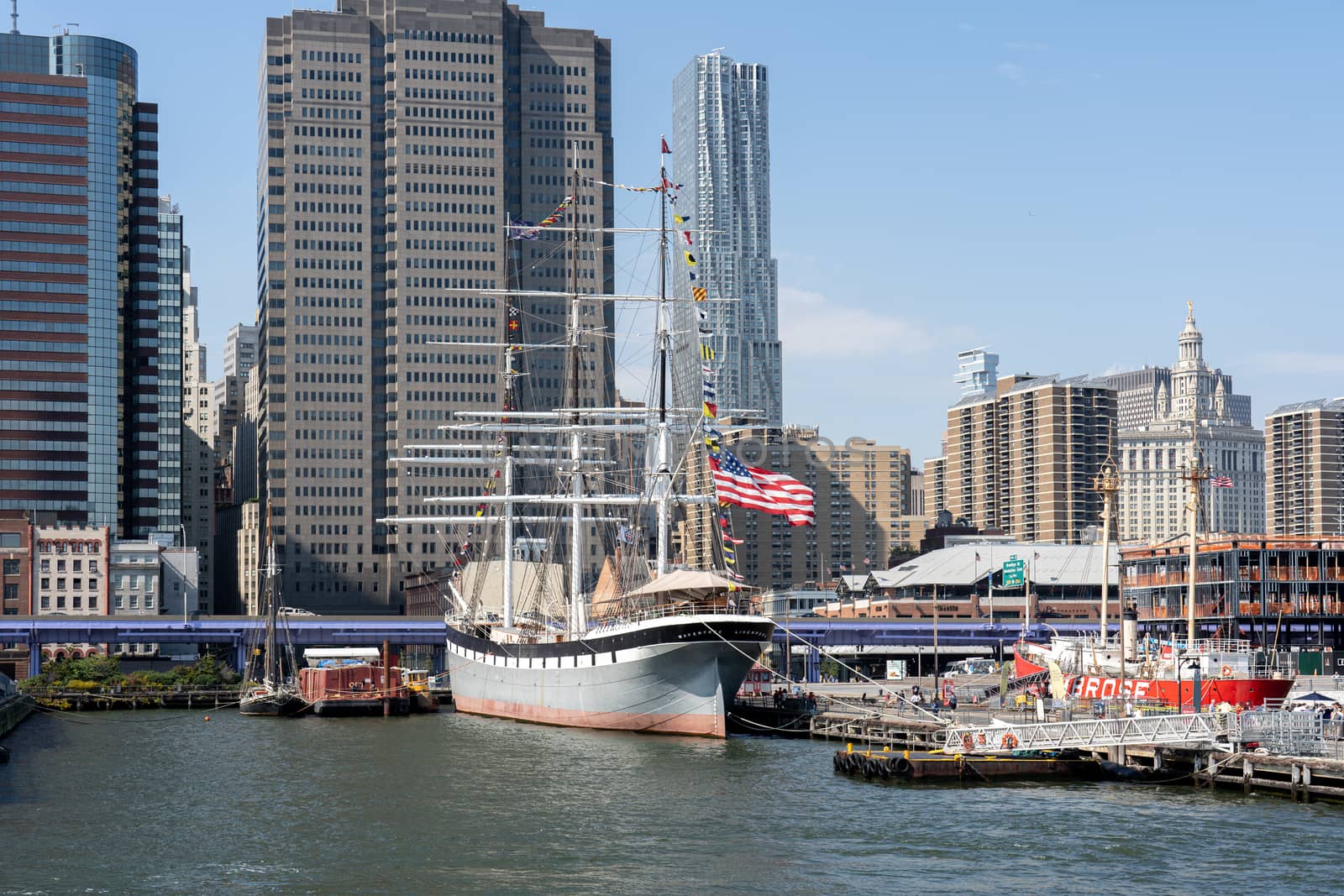 New York, United States - September 23, 2019: Large old sailing boat anchored at pier 15 in Lower Manhattan.