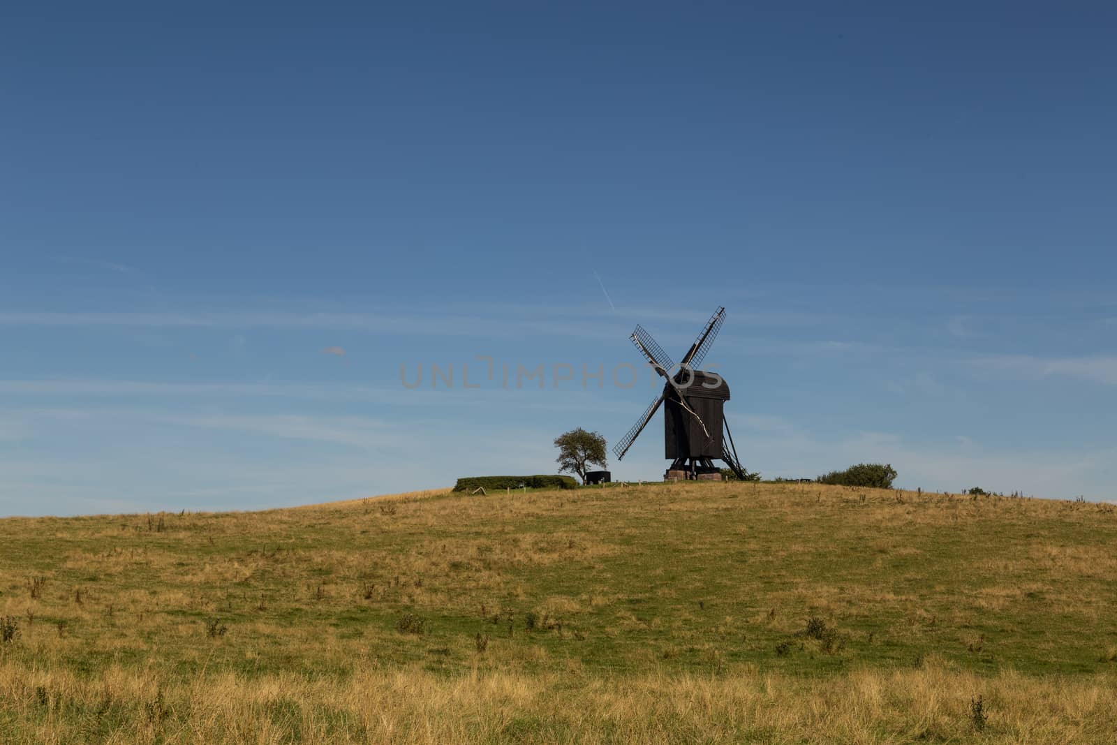 Helsinge, Denmark - August 13, 2015: The historic Danish windmill called Pibe Moelle