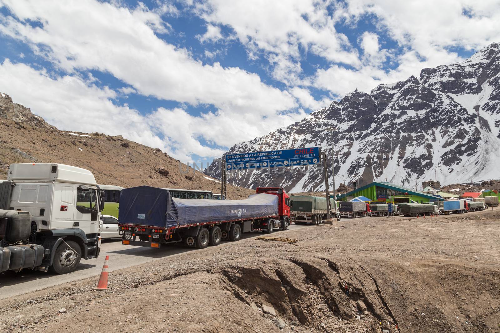 Las Cuevas, Argentina - November 25, 2015: Trucks waiting in line to cross the border from Argentina to Chile