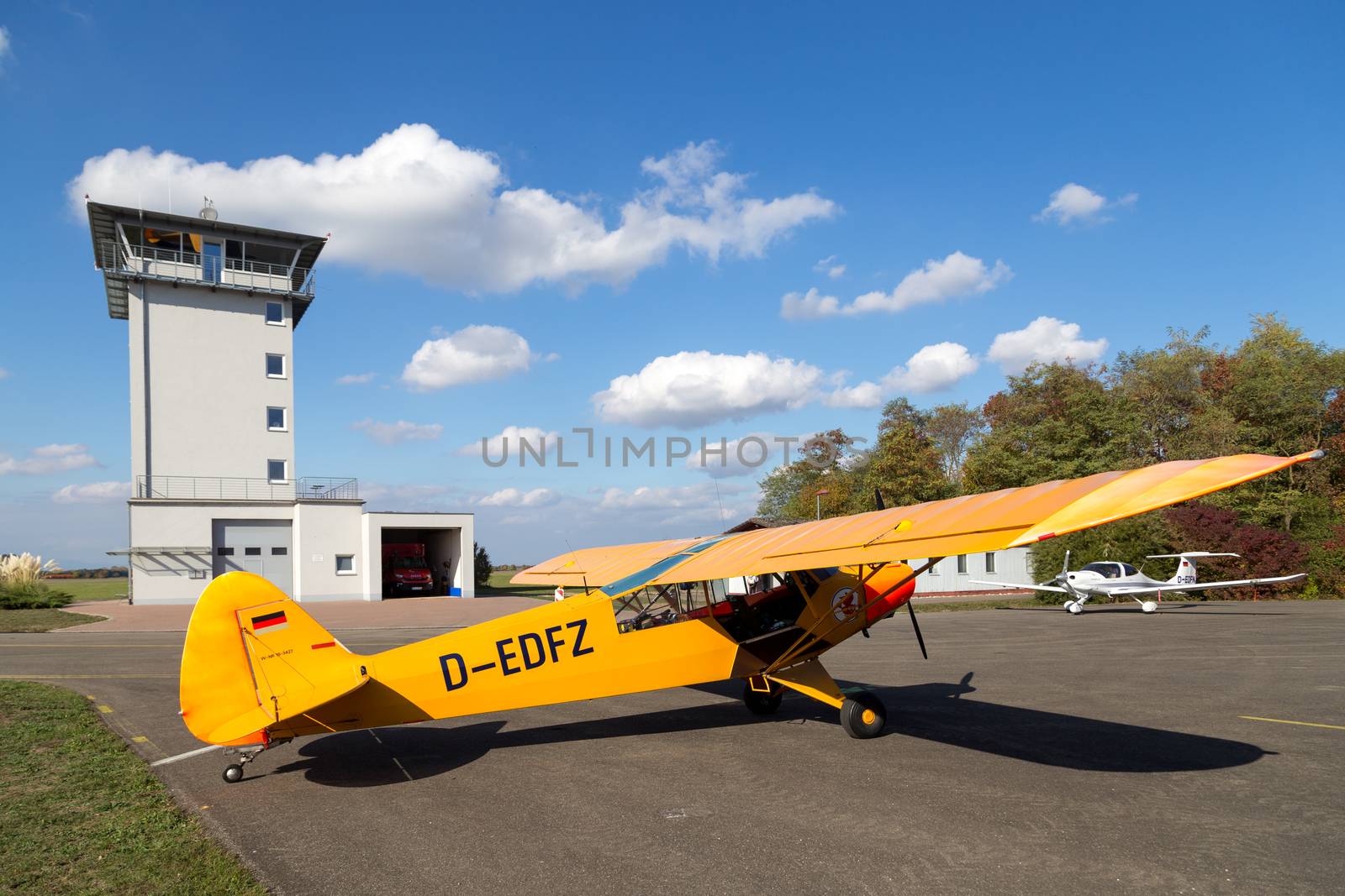 Bremgarten, Germany - October 22, 2016: A classic yellow Piper Cub aircraft parked at the airport